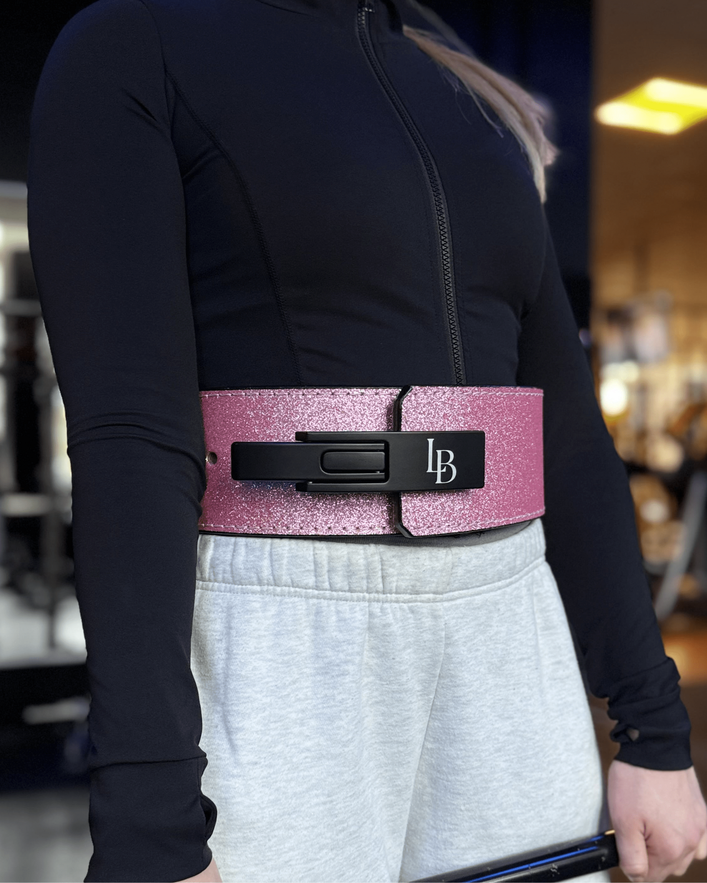 Frauen Gewichthebergürtel in Rosa beim Training